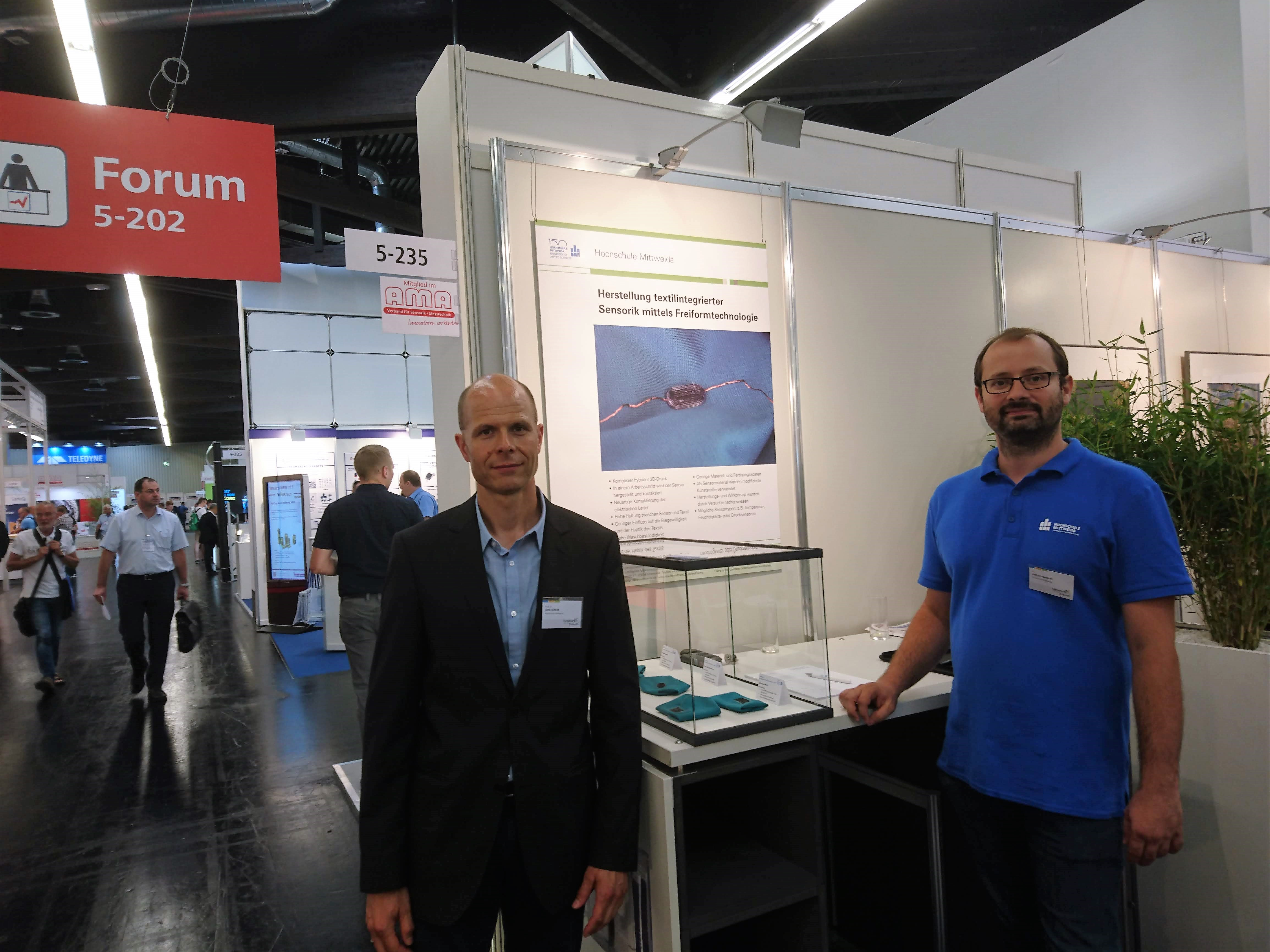 Prof. Jörg Hübler und Dr. Hagen Bankwitz auf der „Sensor+Test 2019“ in Nürnberg